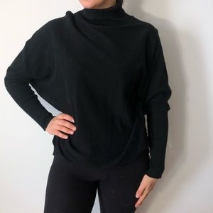 Oversized turtleneck sweater.